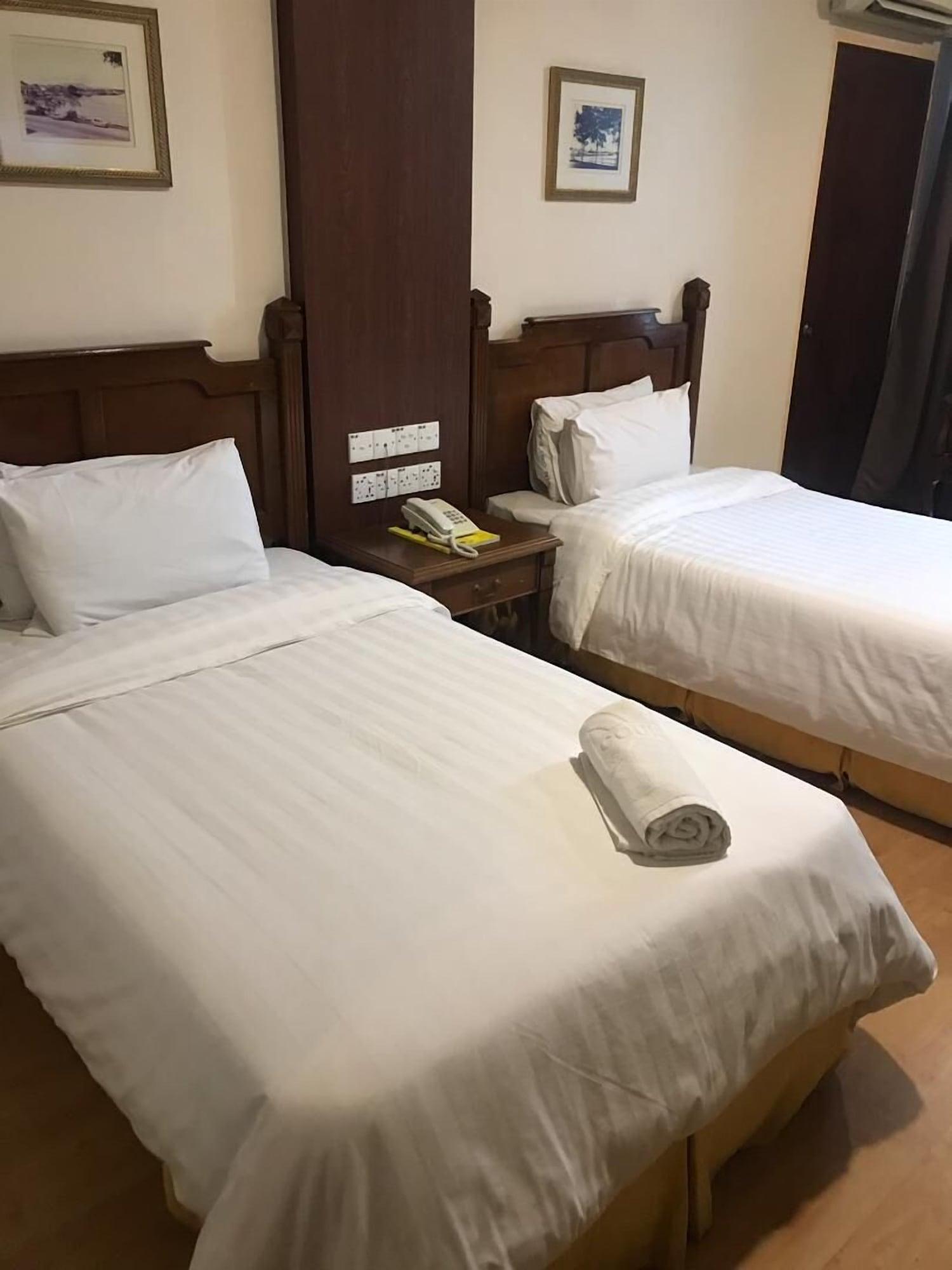 Regal Court Hotel Кучінг Екстер'єр фото